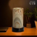 lampara de onix verde en forma de cilindro con base de marmol